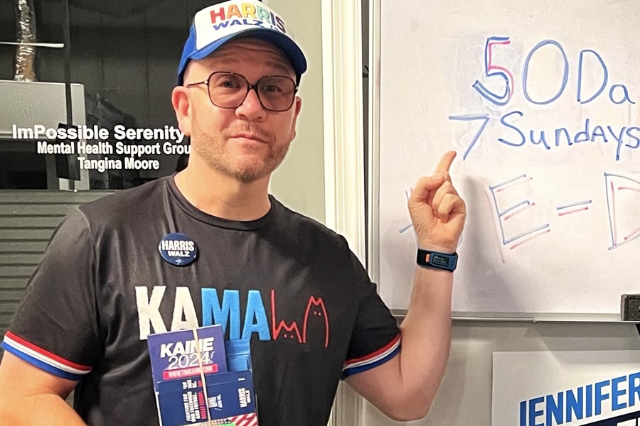 Blue Moreno pointing to a handwritten 50 Days, 7 Sundays election countdown